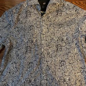 Men’s h &m shirt. It has a unique print .